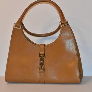 Vintage Gucci Bardo hobo bag in camel leather with the piston-lock closure